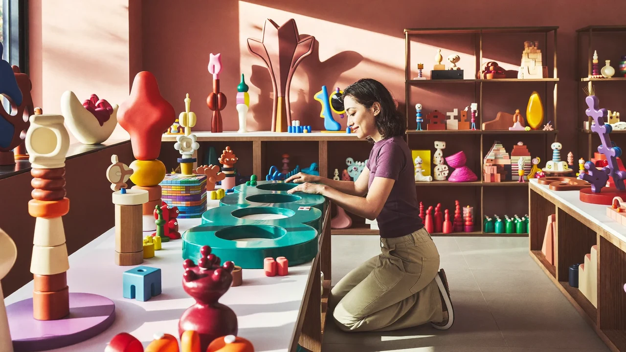 Illustration einer Spielwelt aus Holz, Farbe und klaren Formen